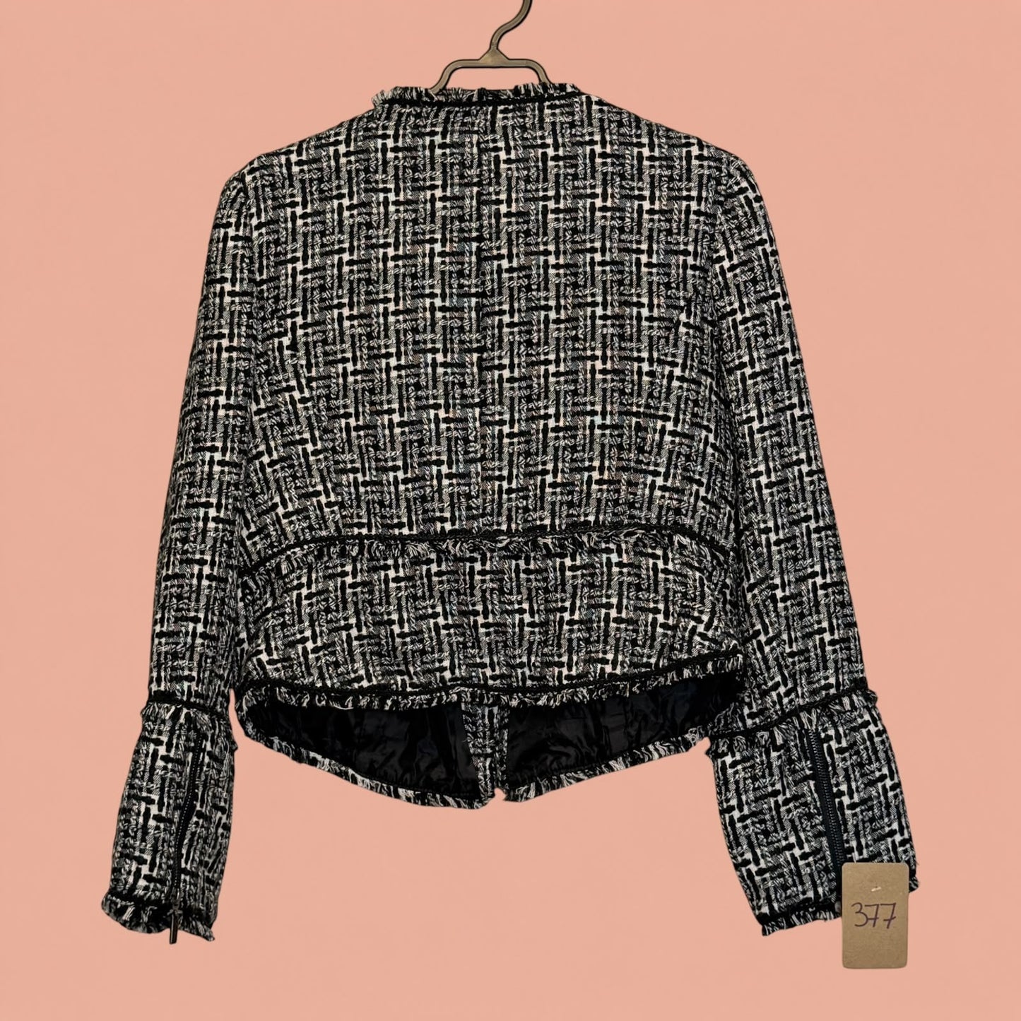 Blazer Tuclosetrenovado.cl de segunda mano con estampado de cuadros en blanco y negro y detalles de flecos
