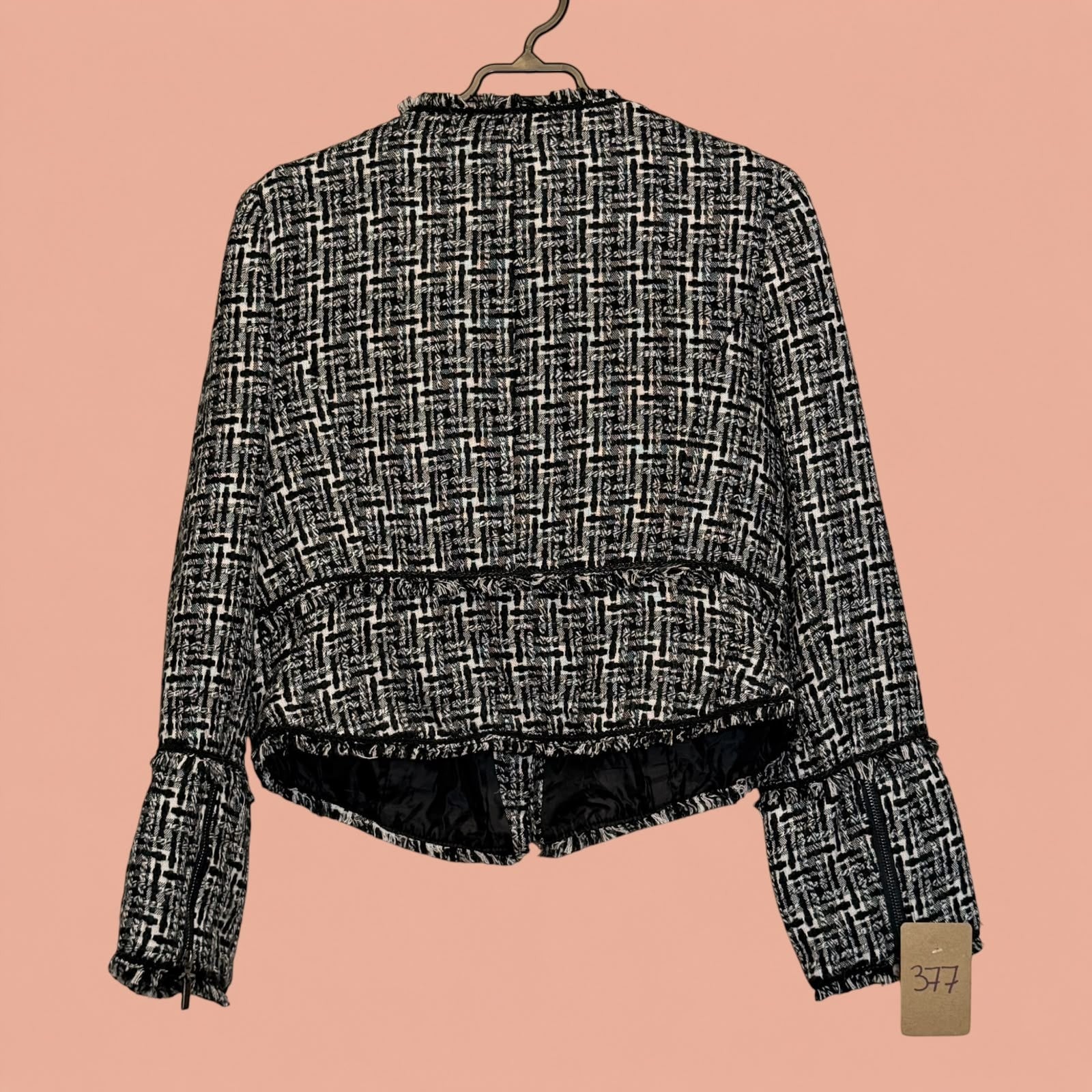 Blazer Tuclosetrenovado.cl de segunda mano con estampado de cuadros en blanco y negro y detalles de flecos