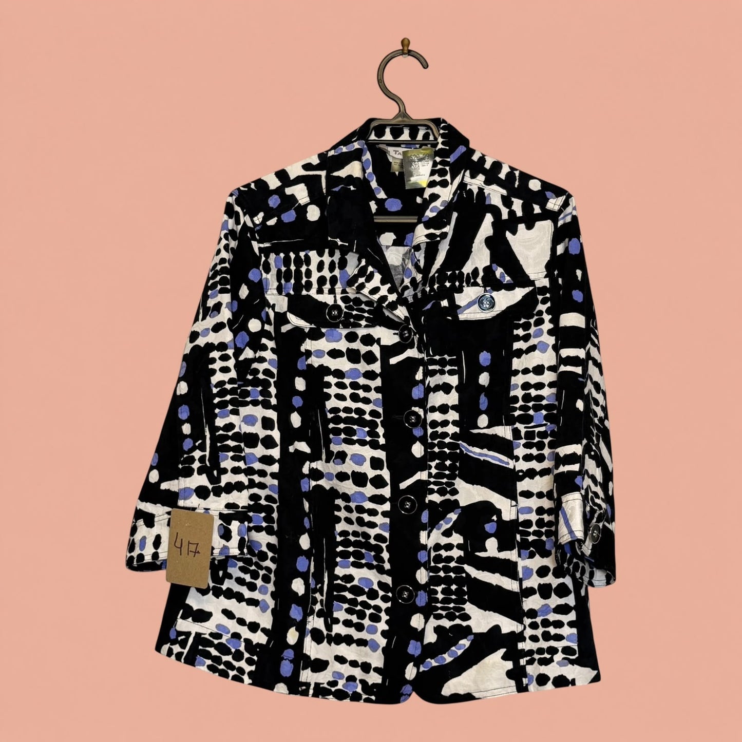 Blazer Tuclosetrenovado.cl de segunda mano con estampado geométrico abstracto en blanco, negro y azul