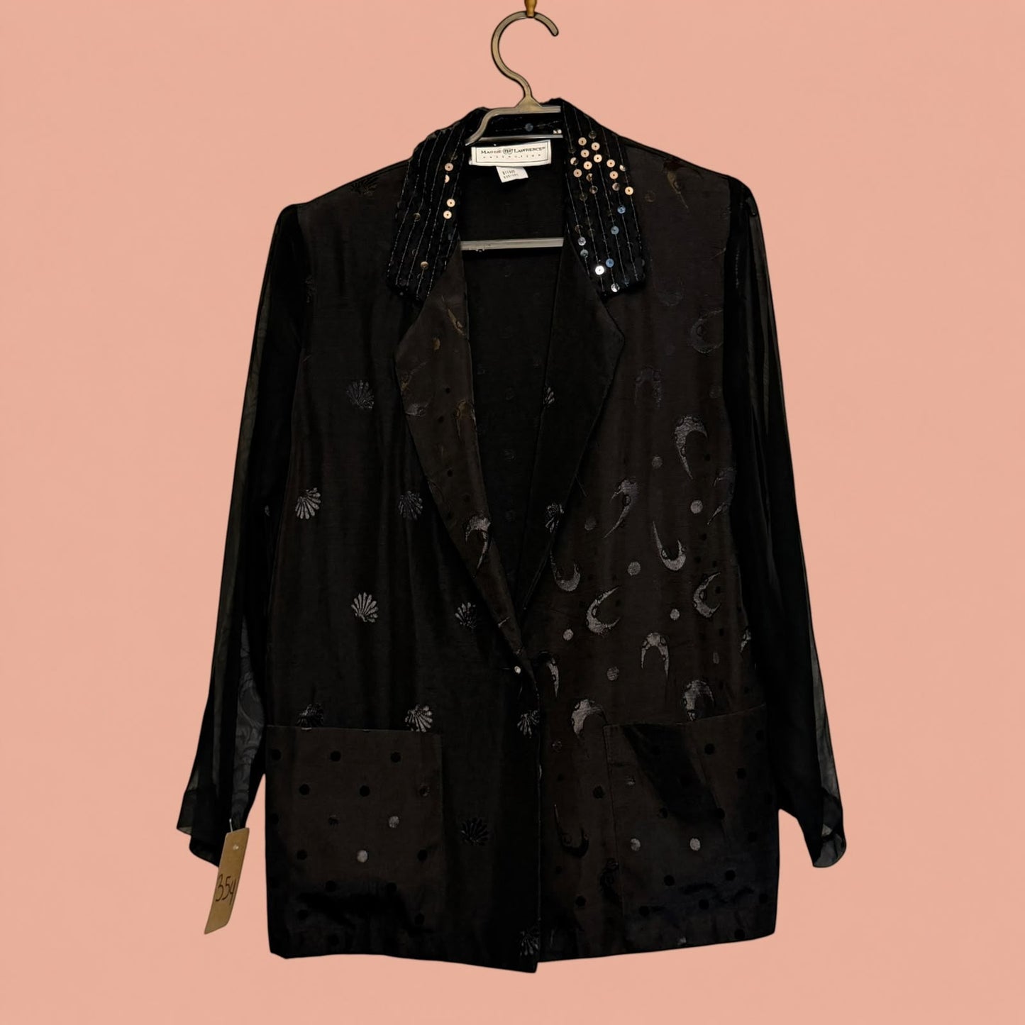 Blazer negro de segunda mano de Tuclosetrenovado.cl con solapas de lentejuelas y estampado de motivos marinos