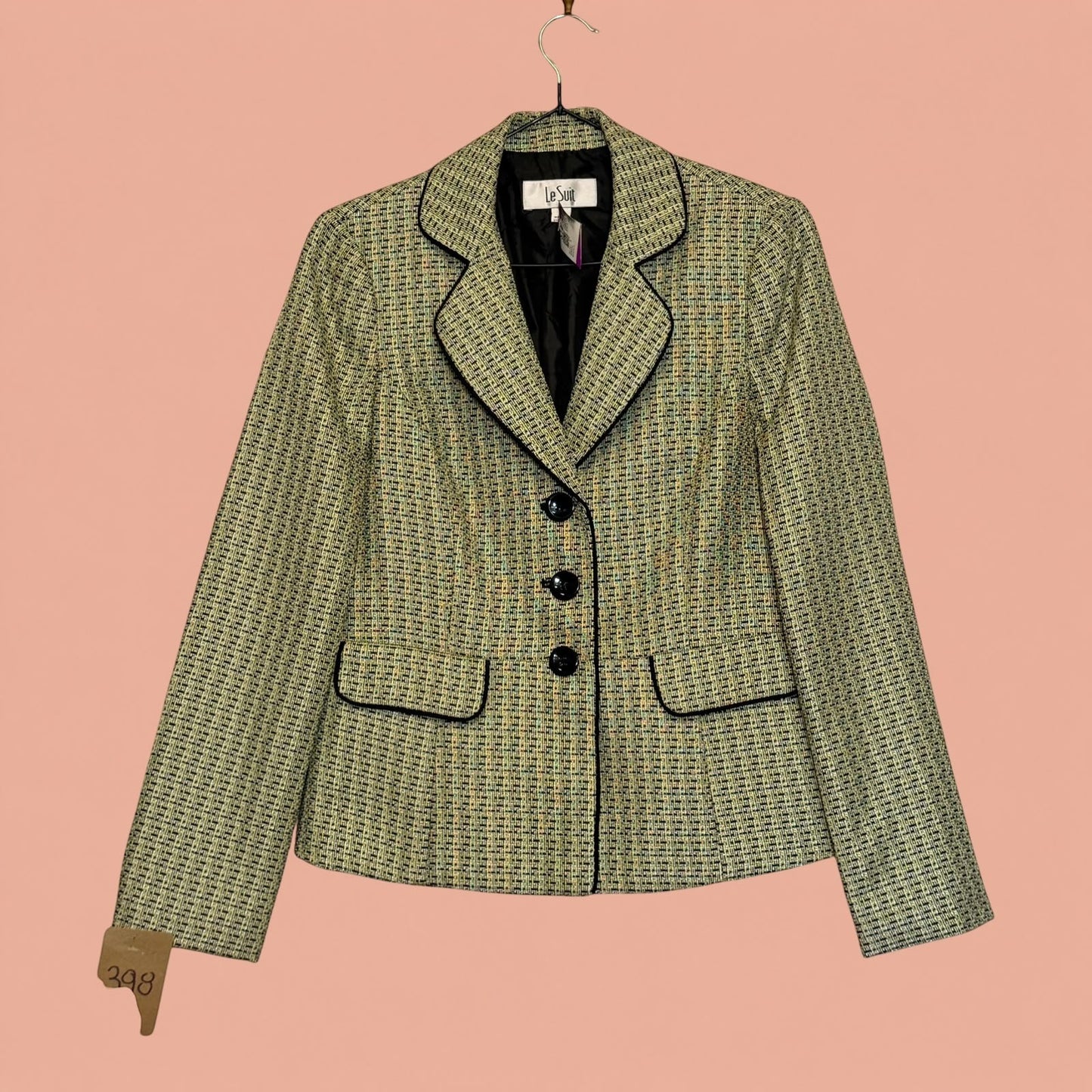 Blazer de segunda mano Tuclosetrenovado.cl en tejido tweed multicolor con ribetes negros y cierre de tres botones