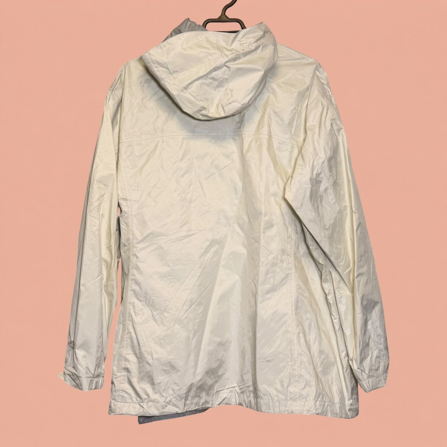 Chaqueta cortavientos beige de hombre Tuclosetrenovado.cl con capucha, vista trasera