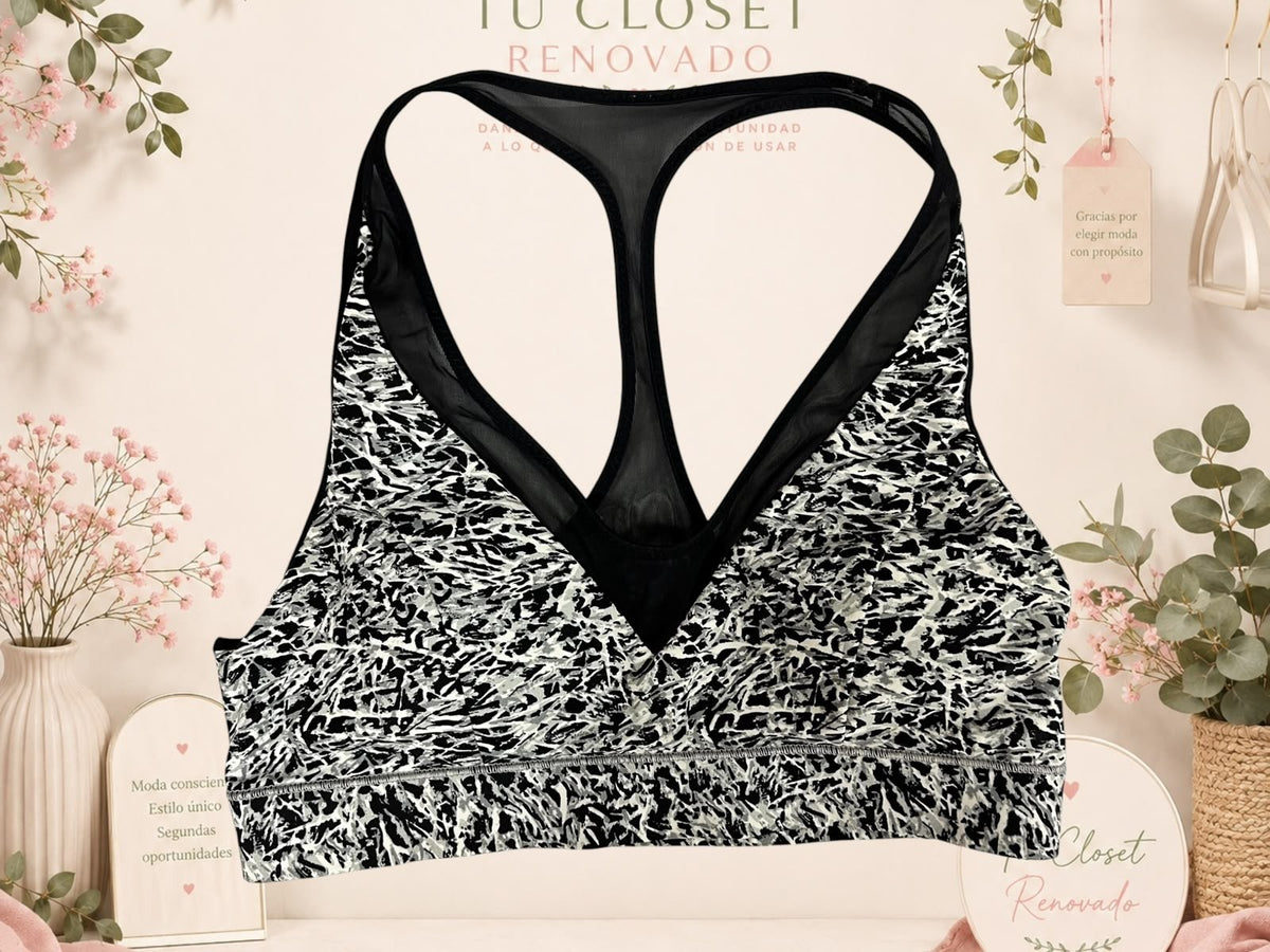 Sujetador deportivo Tuclosetrenovado.cl con estampado abstracto en blanco y negro y espalda de nadador en malla negra
