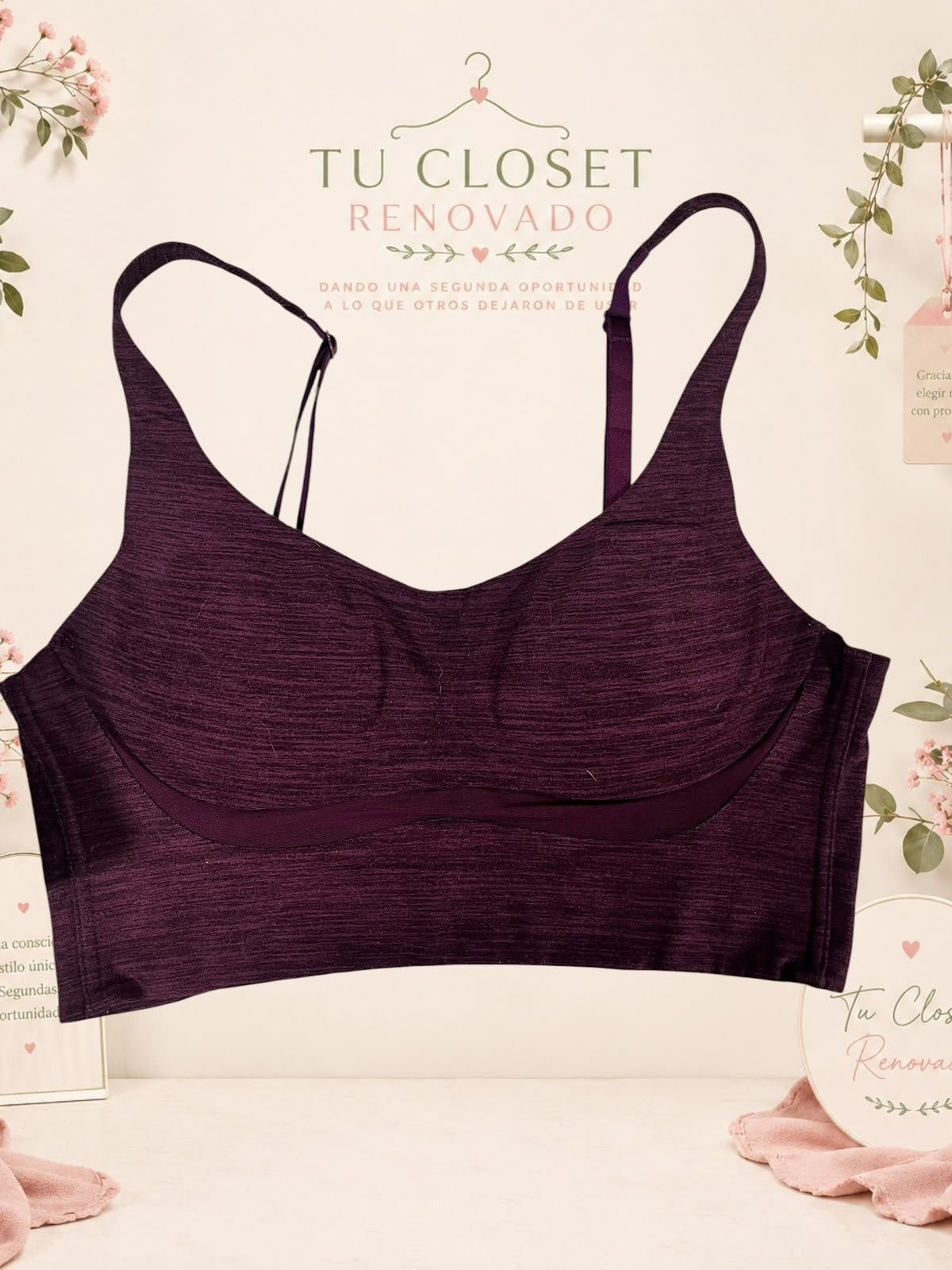 Sujetador deportivo Tuclosetrenovado.cl de color morado oscuro con textura jaspeada y tirantes ajustables