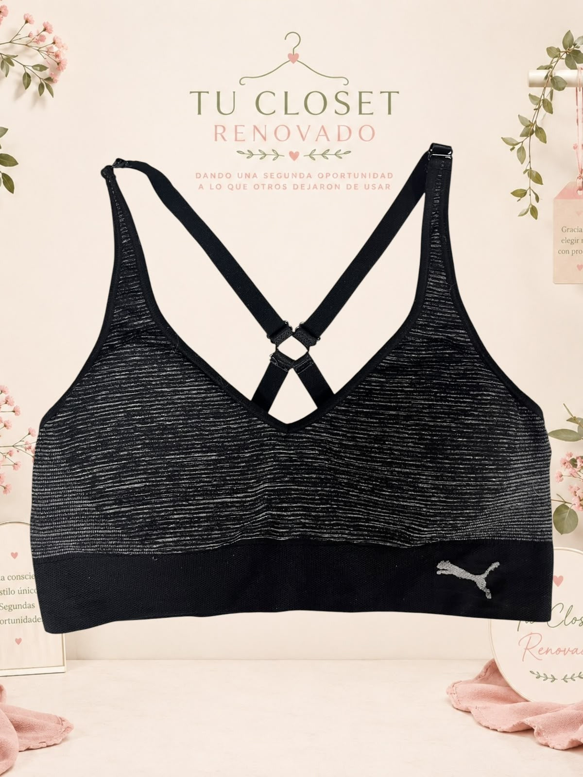 Sujetador deportivo Puma negro con textura jaspeada y tirantes cruzados en la espalda de Tuclosetrenovado.cl