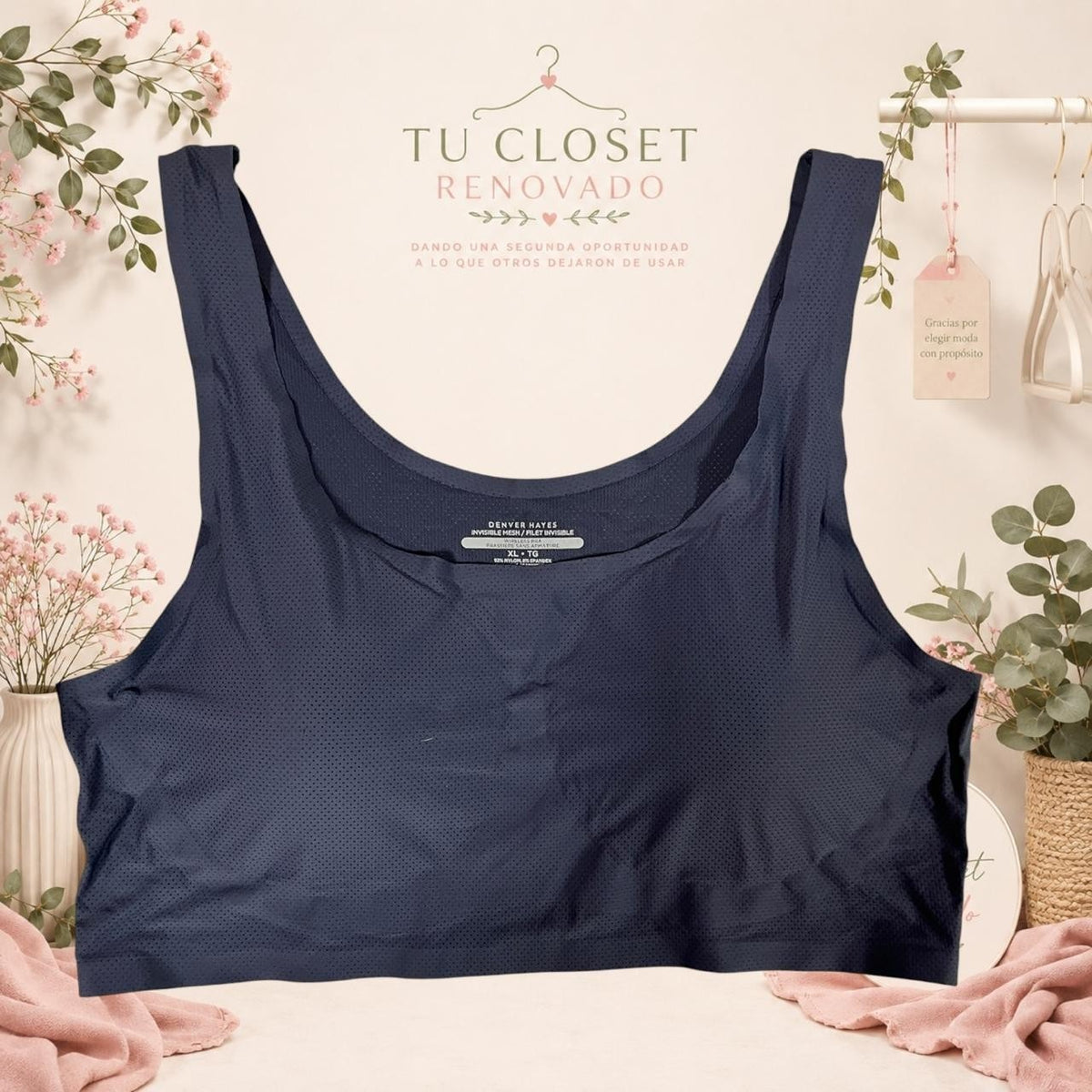 Top deportivo Tuclosetrenovado.cl de color azul marino con tejido perforado transpirable y cuello redondo