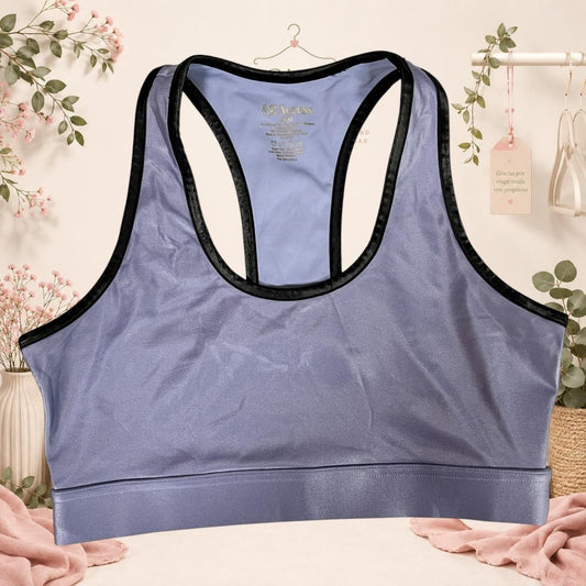 Top deportivo Tuclosetrenovado.cl color lavanda con ribetes negros y espalda estilo nadador para mujer