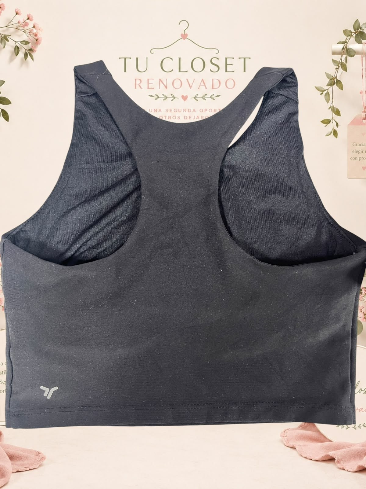 Top deportivo negro con espalda nadadora de Tuclosetrenovado.cl, ideal para entrenamiento y soporte cómodo.