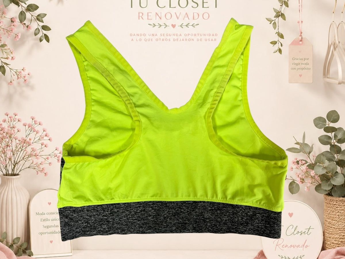 Top deportivo Tuclosetrenovado.cl de color verde neón con banda elástica inferior gris jaspeado